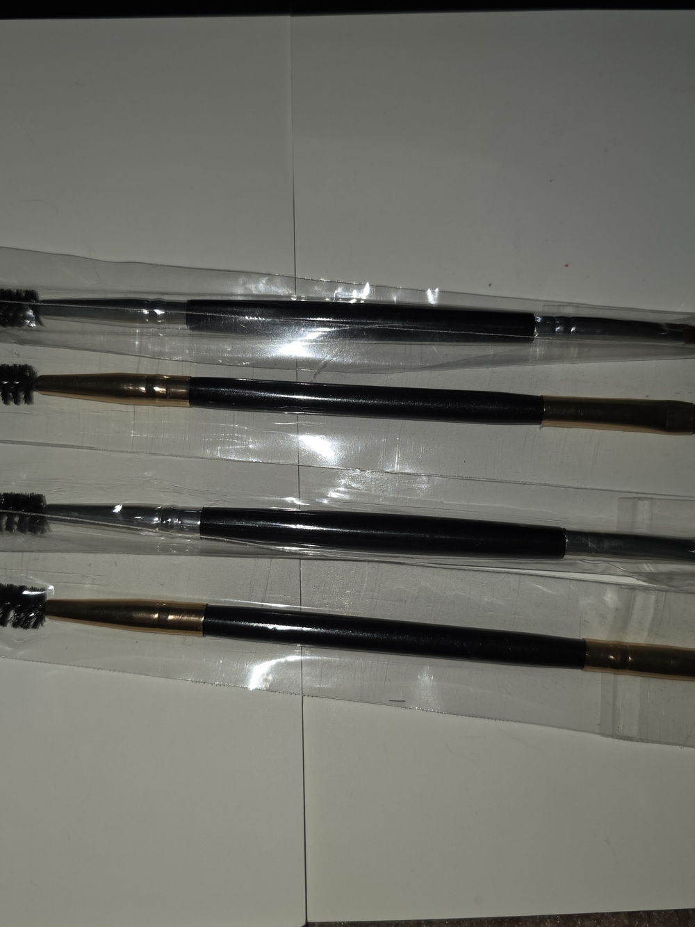 4 pc setDual-Ended Eyebrow Brush Set in Black and Gold